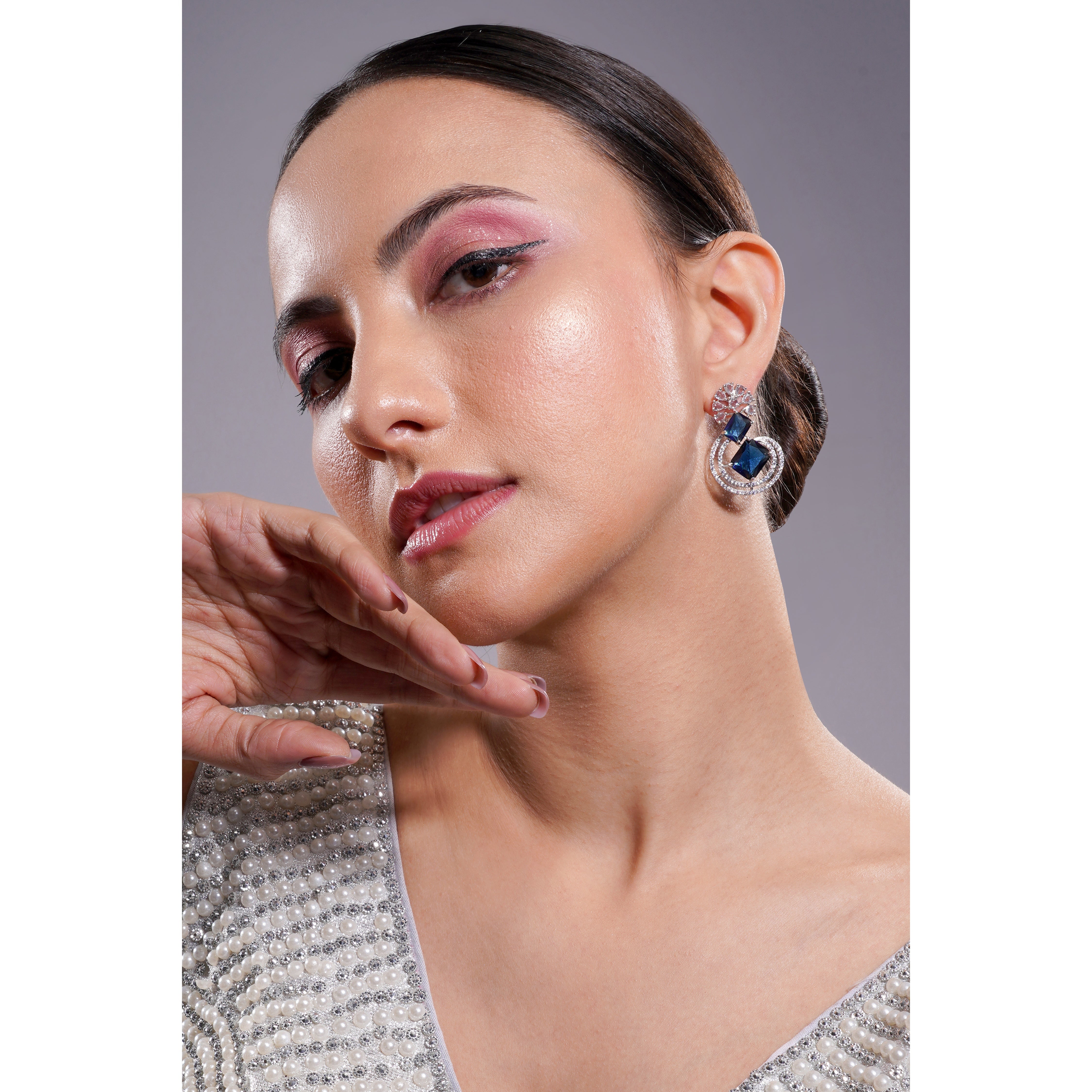 Amaita American Diamond Navy Blue Stone Swirl Drop Earrings