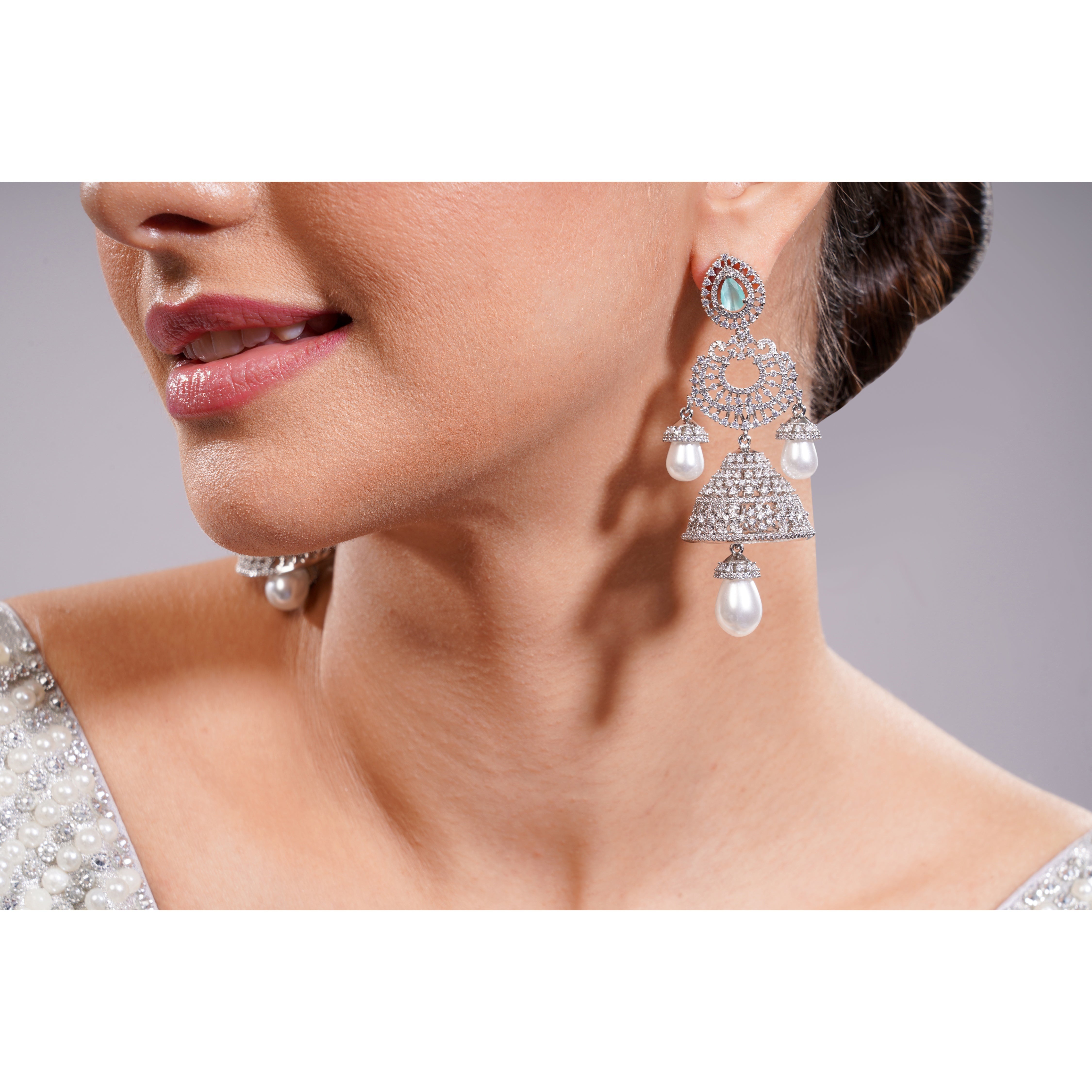 Amaita Silver Tone AD Mint Green Stone Layered Jhumka Pearl Drop