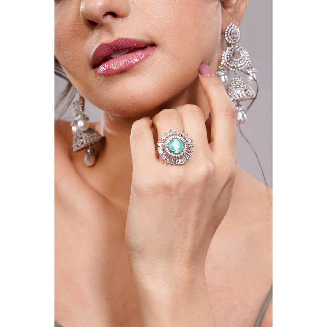Amaita Platinum Polish AD Mint Green Oval Stone Sunburst Cocktail Ring