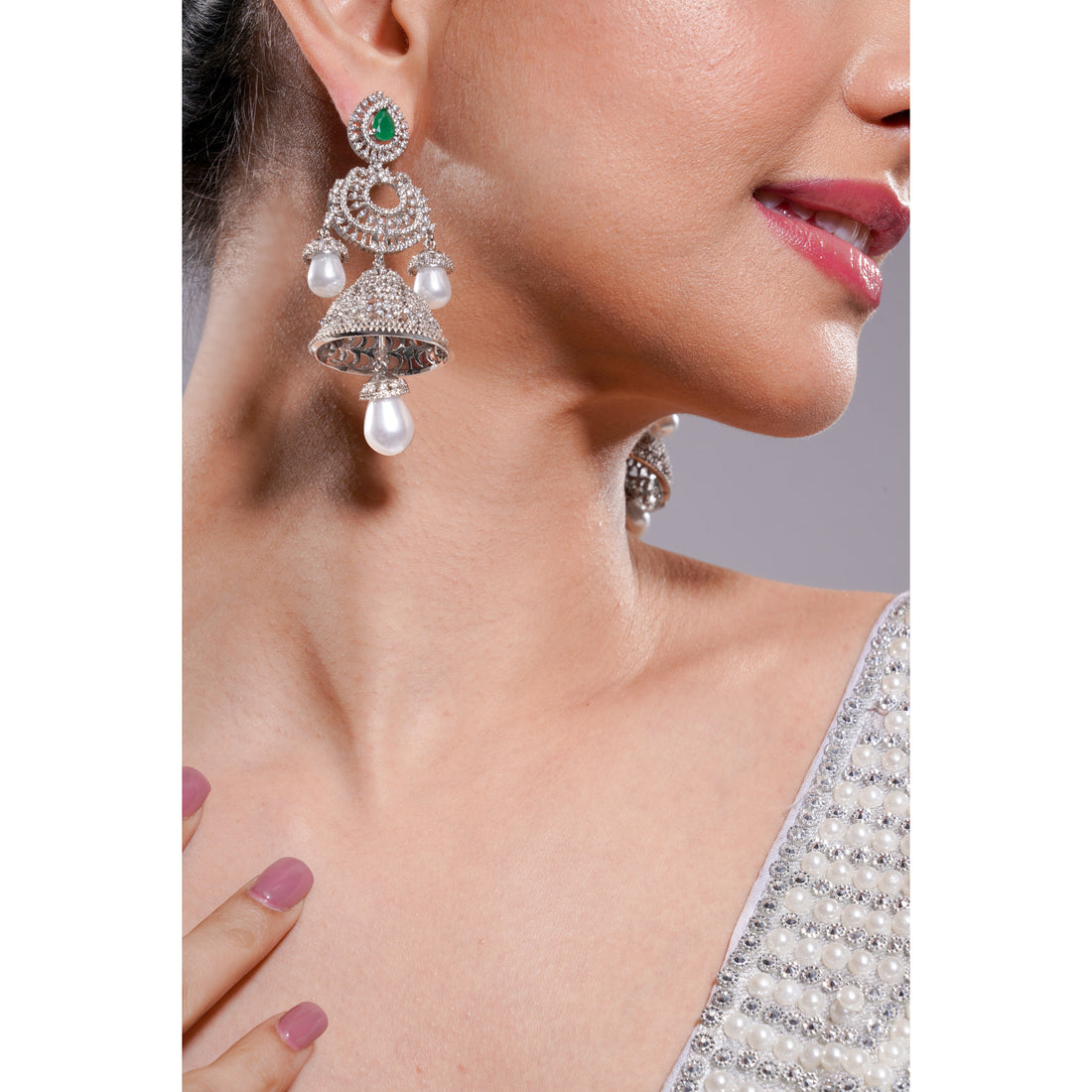 Amaita AD Emerald Green Stone Jhumka Earrings in Silver Finish