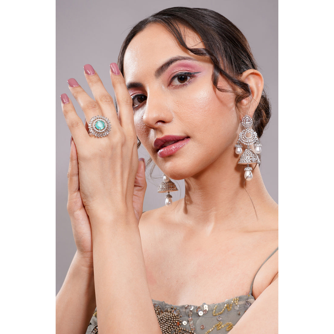 Amaita Platinum Polish AD Mint Green Oval Stone Sunburst Cocktail Ring