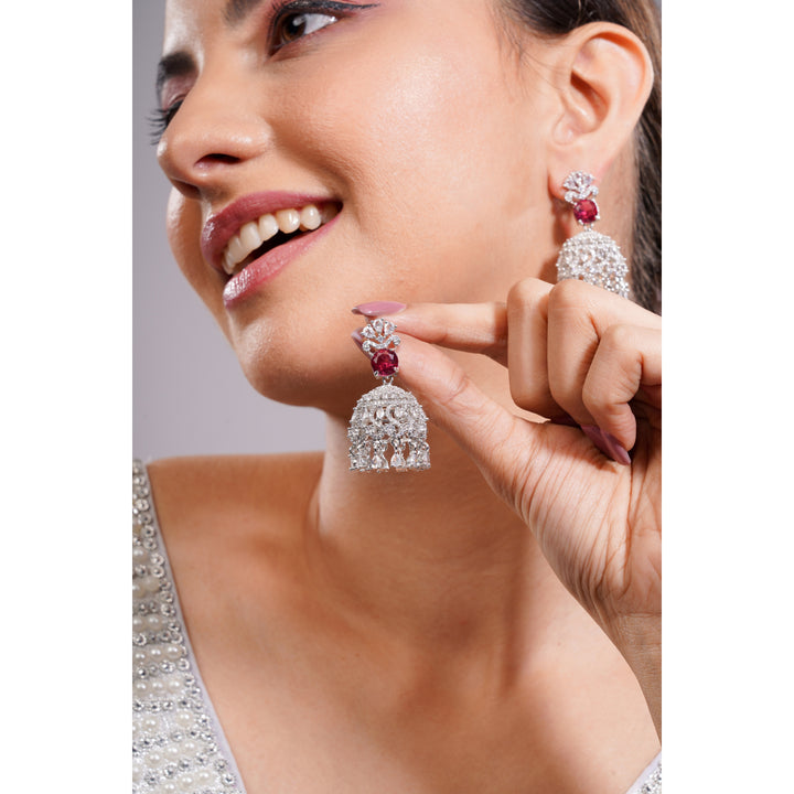 Amaita AD Deep Red Stone Dome Jhumka Earrings in Platinum Finish