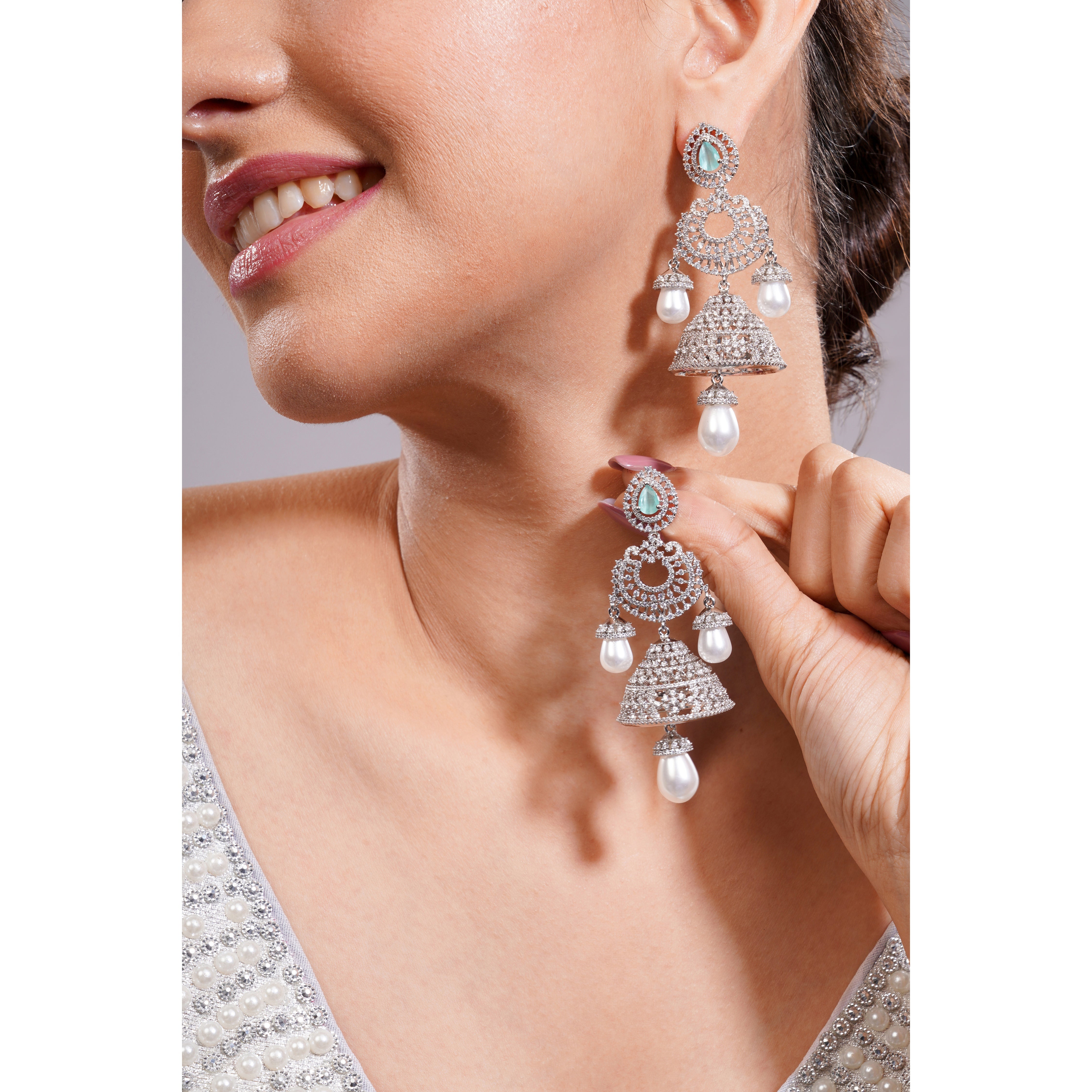 Amaita Silver Tone AD Mint Green Stone Layered Jhumka Pearl Drop