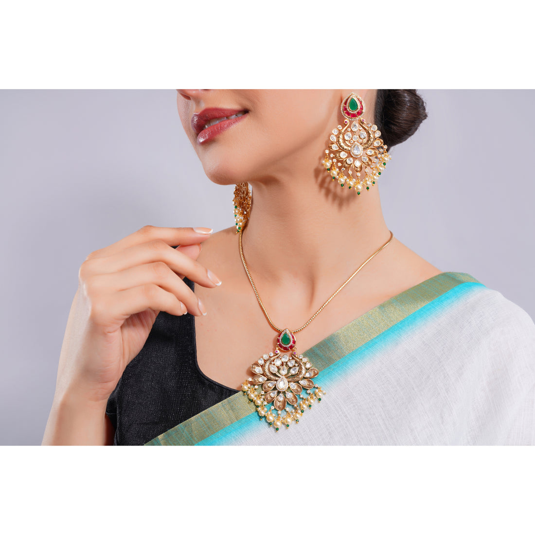 Amaita Demi Fine Ethnic Polki Emerald Ruby Stone Gold Chain Pendant Chandbali Set