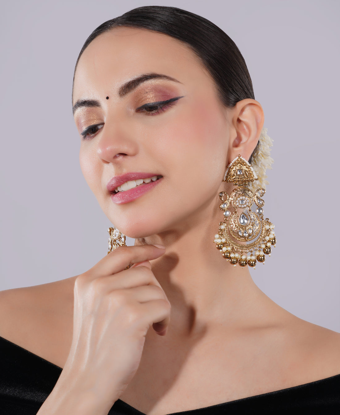 Amaita Gold-Finished Temple Jewellery Jhumka Earrings