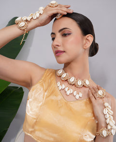 Amaita Gold Finish Shell Ghungroo Earring and Handpiece Set