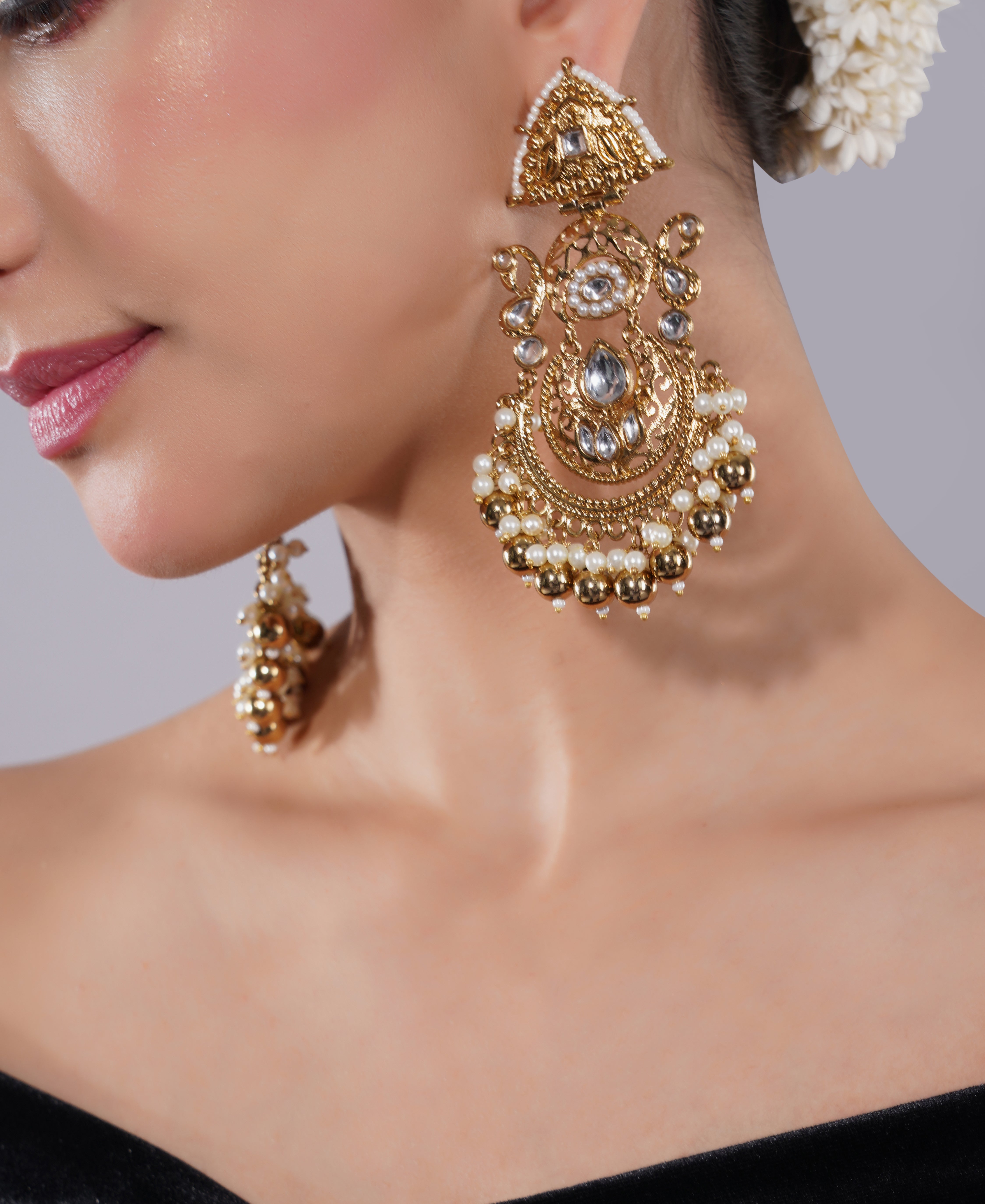 Amaita Gold-Finished Temple Jewellery Jhumka Earrings