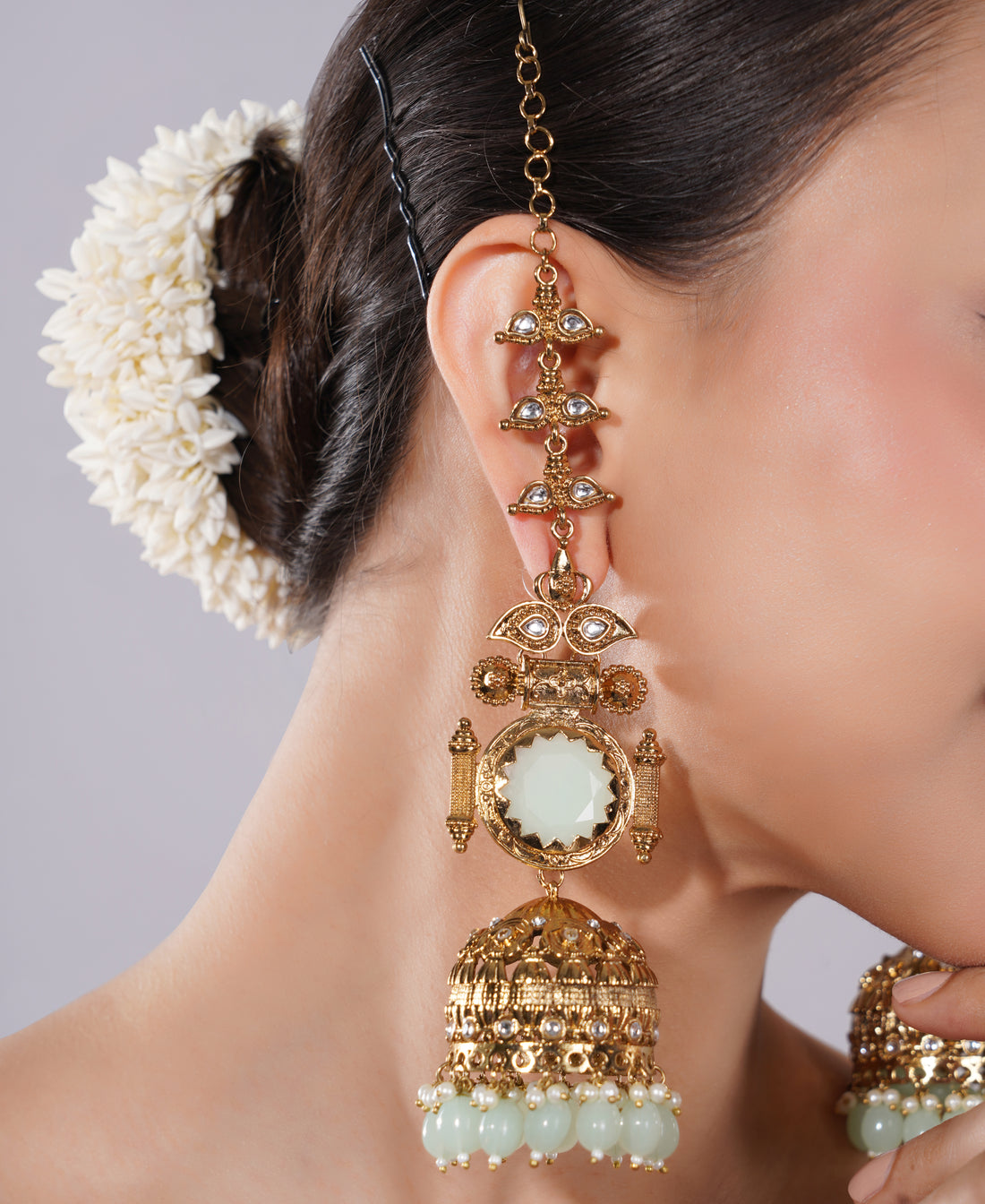 Amaita Gold Finish Mint Green Jhumka Earrings