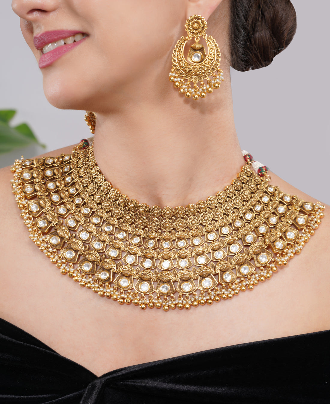 Amaita Gold-Finished Kundan Choker Necklace with Pearl Detailing