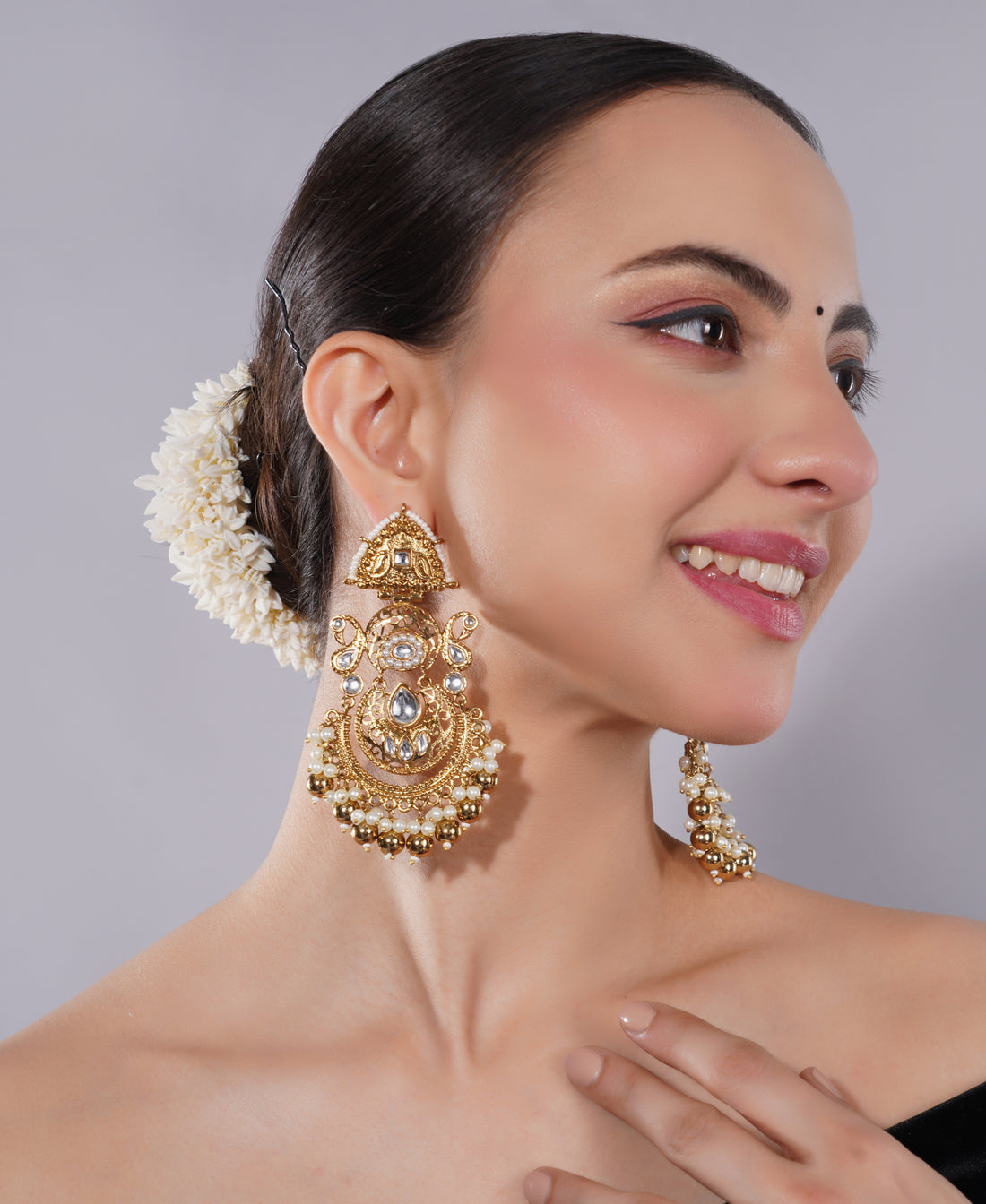 Amaita Gold-Finished Temple Jewellery Jhumka Earrings