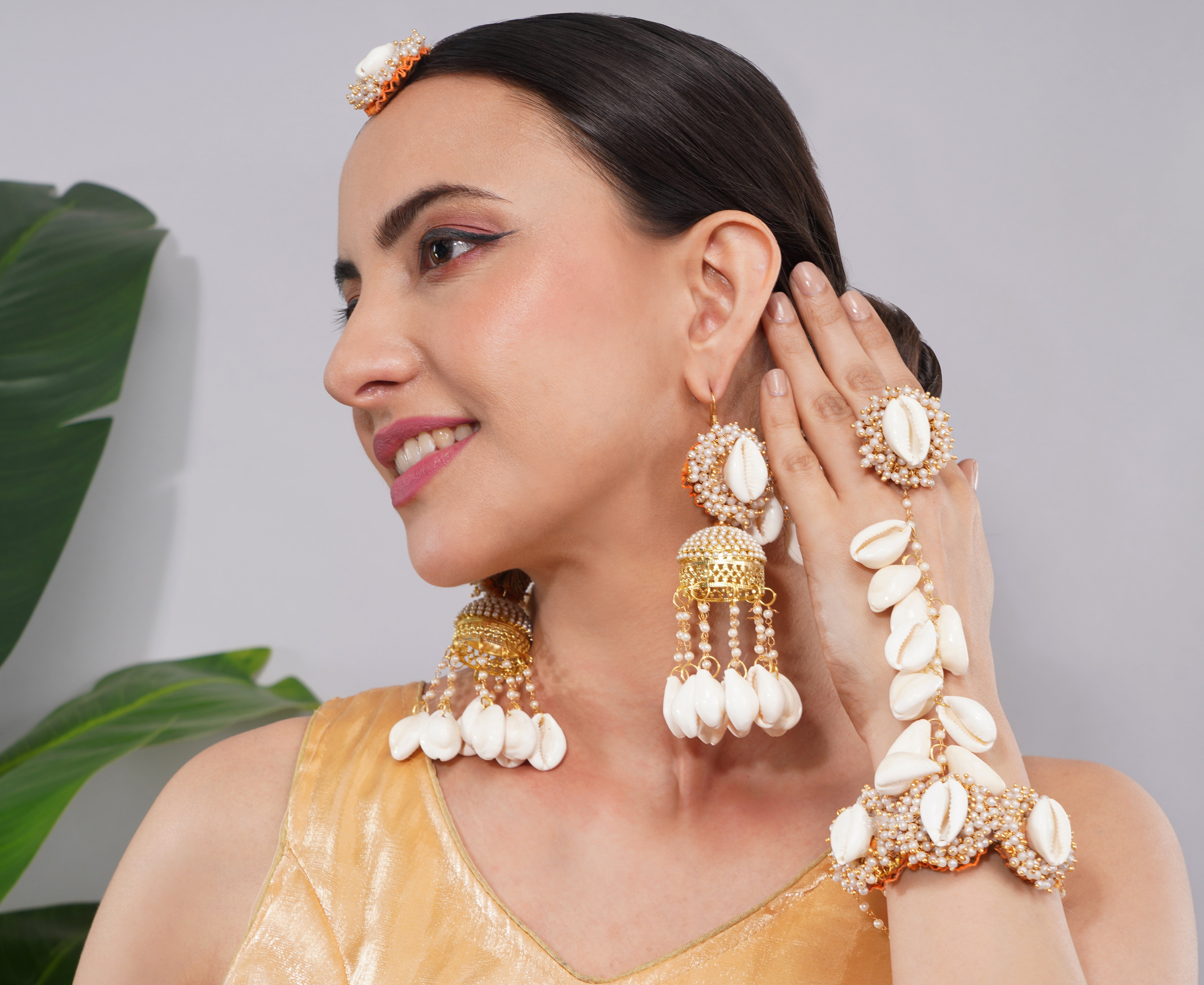 Amaita Gold Finish Shell Ghungroo Earring and Handpiece Set