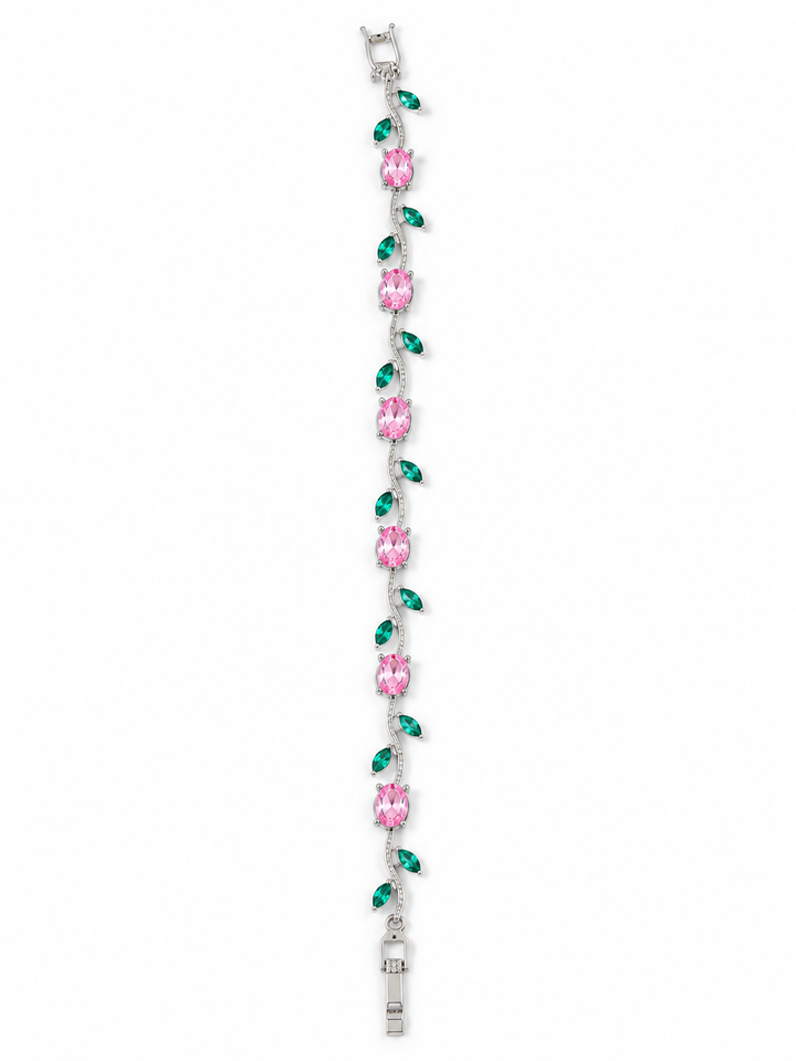 A silver-toned bracelet featuring alternating pink oval gemstones and green teardrop-shaped stones, set in a silver-toned metal on a plain white background.