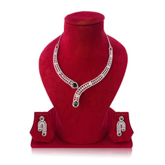 Jewelry set with necklace and earrings on a red velvet stand against a white background