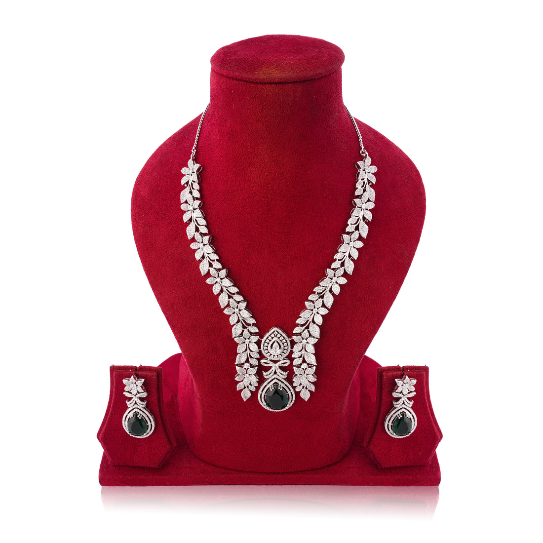 Jewelry set with necklace and earrings on a red velvet stand against a white background