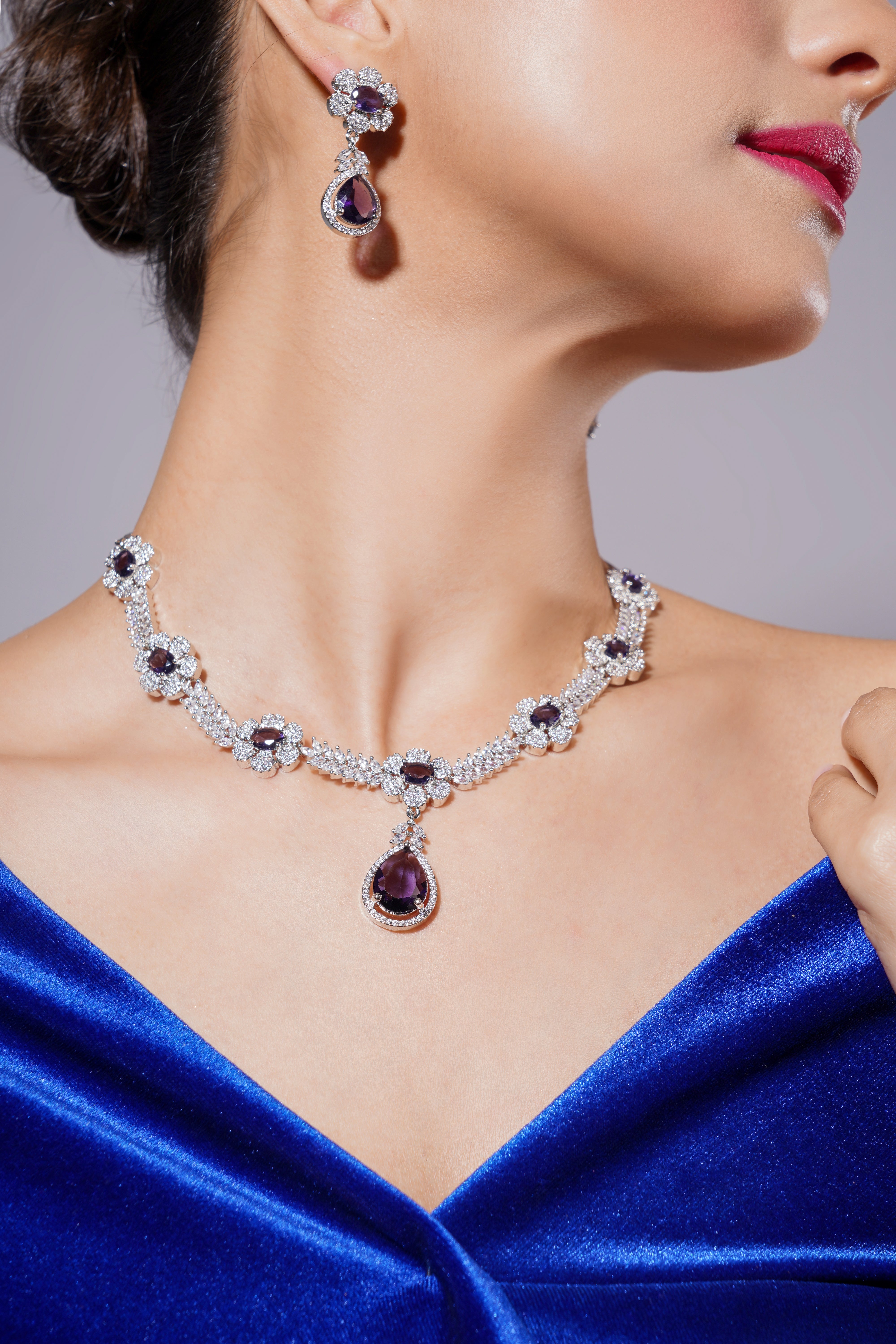 Amaita Royal Purple Stone Floral Platinum Polish Jewellery Set