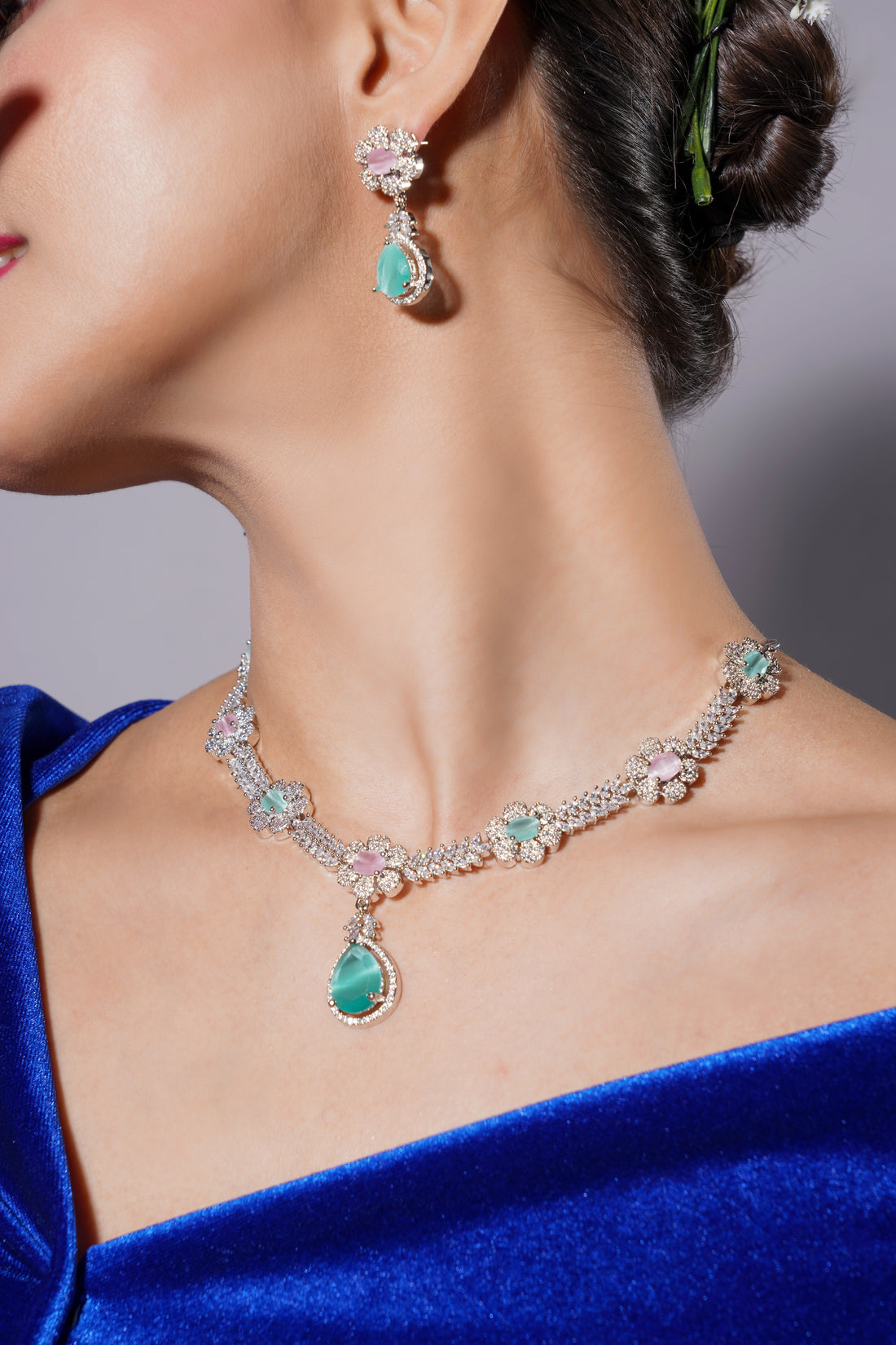 Amaita Elegant Platinum Finish Floral Necklace with Turquoise Stones