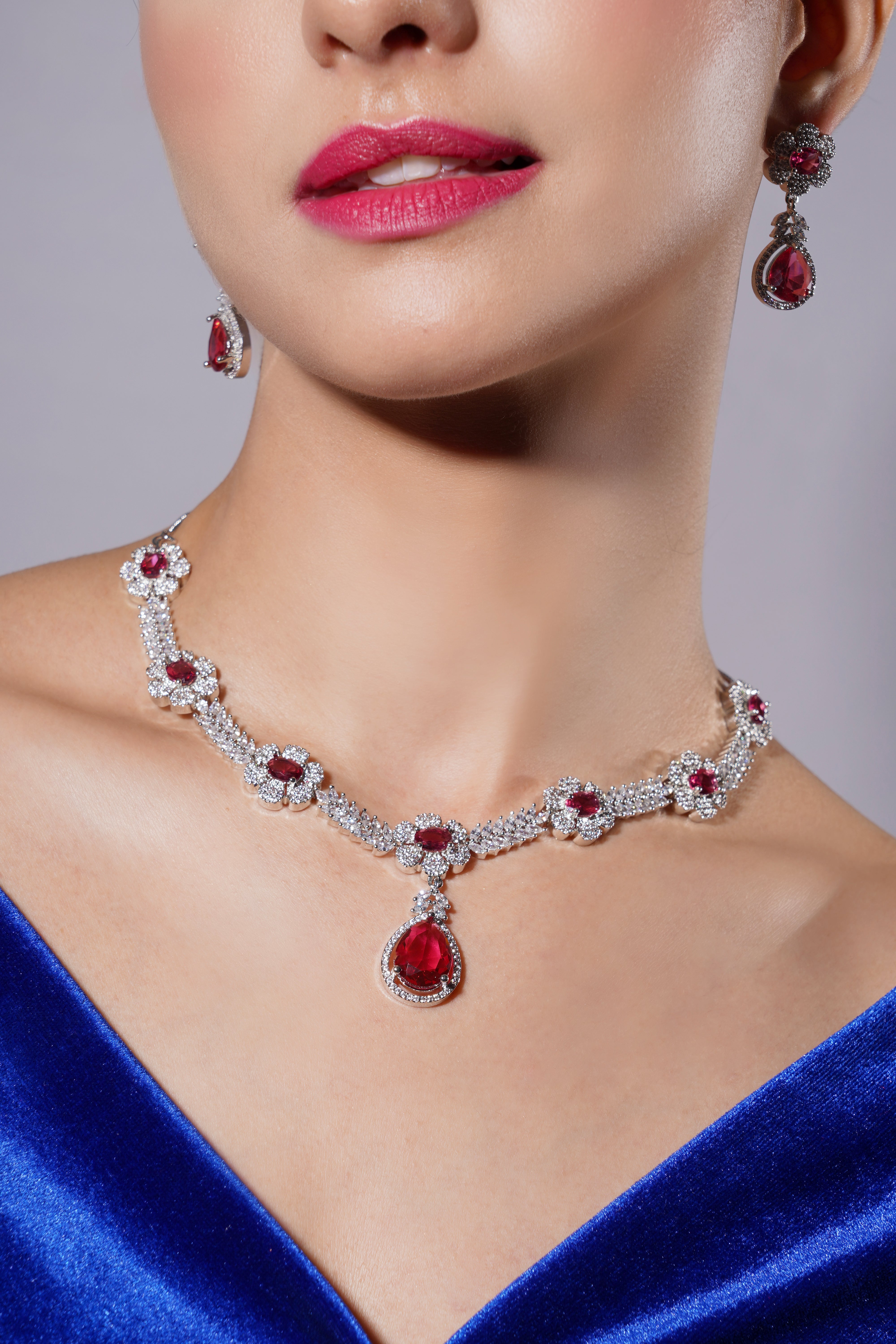 Amaita Radiant Platinum Polish Necklace & Earrings Set in Ruby Red Stones