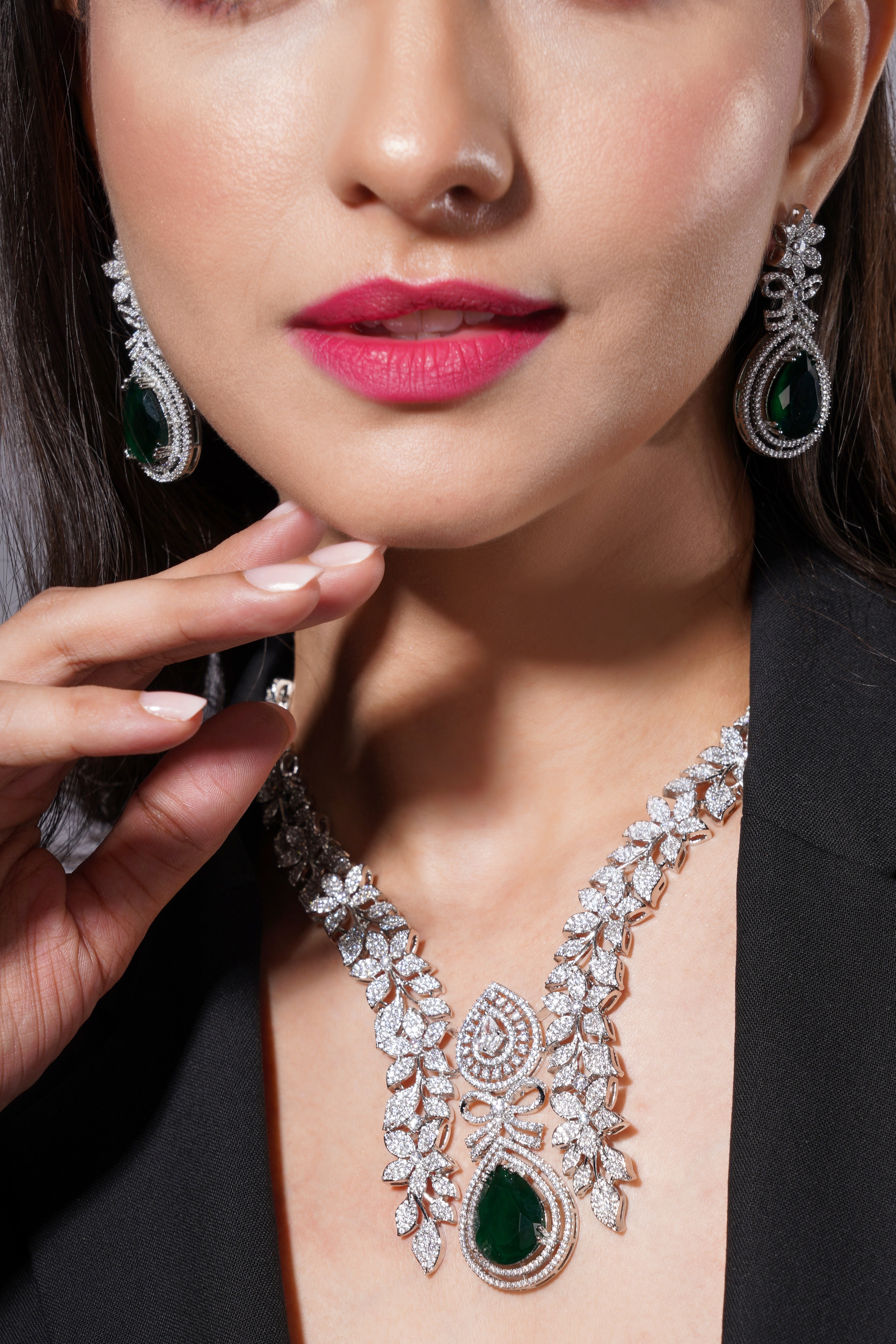 Amaita Platinum Finish Emrald Green Stone Leaf Design Luxe Jewellery Set