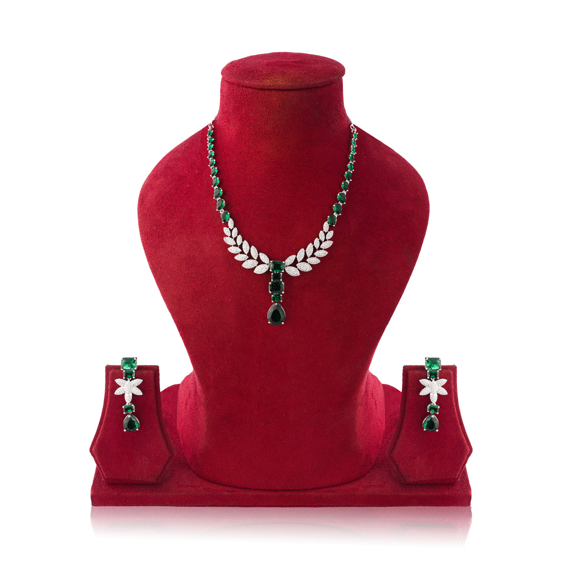 Jewelry set with necklace and earrings on a red mannequin bust against a white background