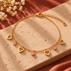 Amaita demi-fine gold open heart and pink crystal dangle charm bracelet