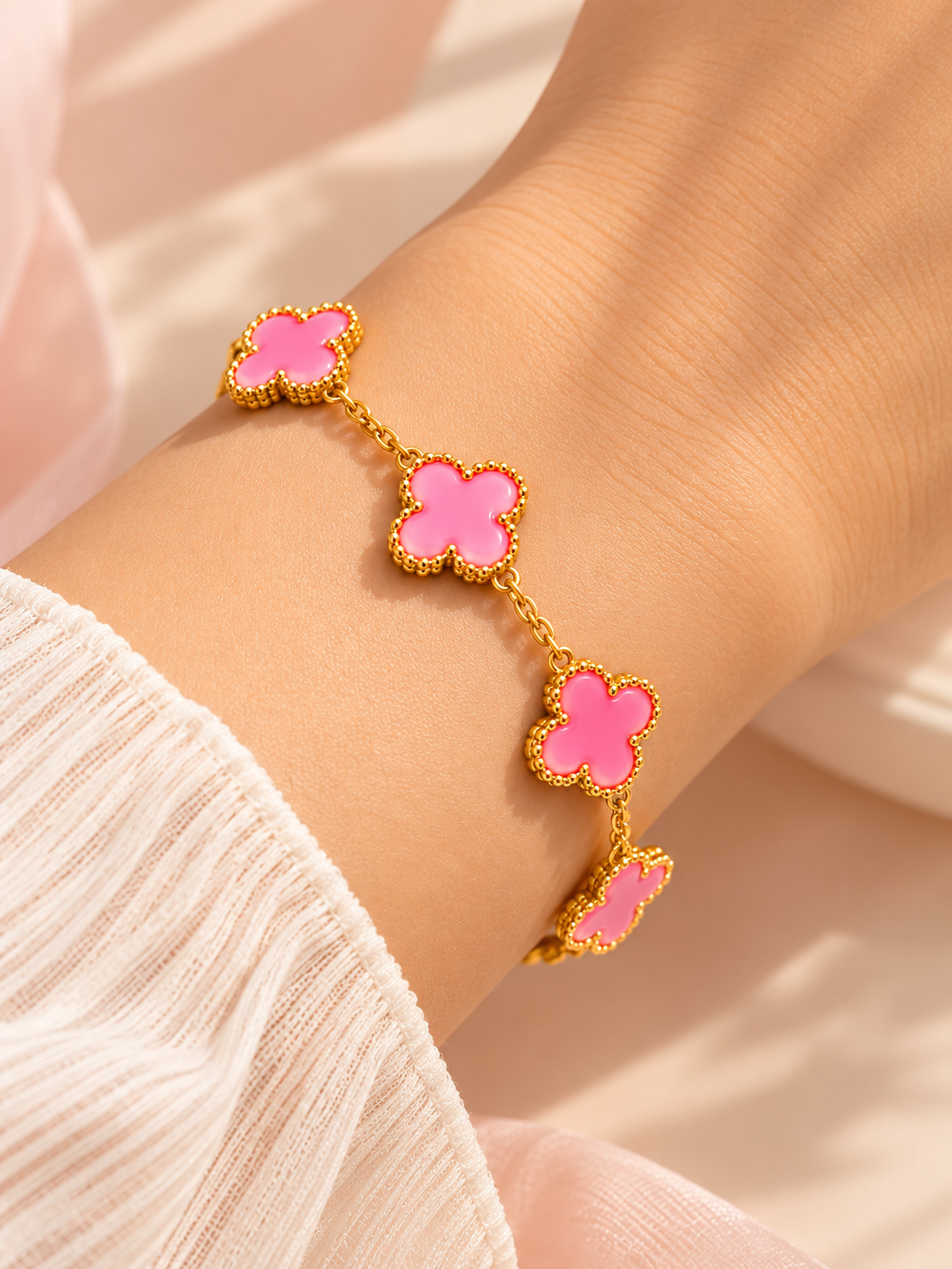 Amaita demi-fine pink enamel five-motif clover charm bracelet with gold finish