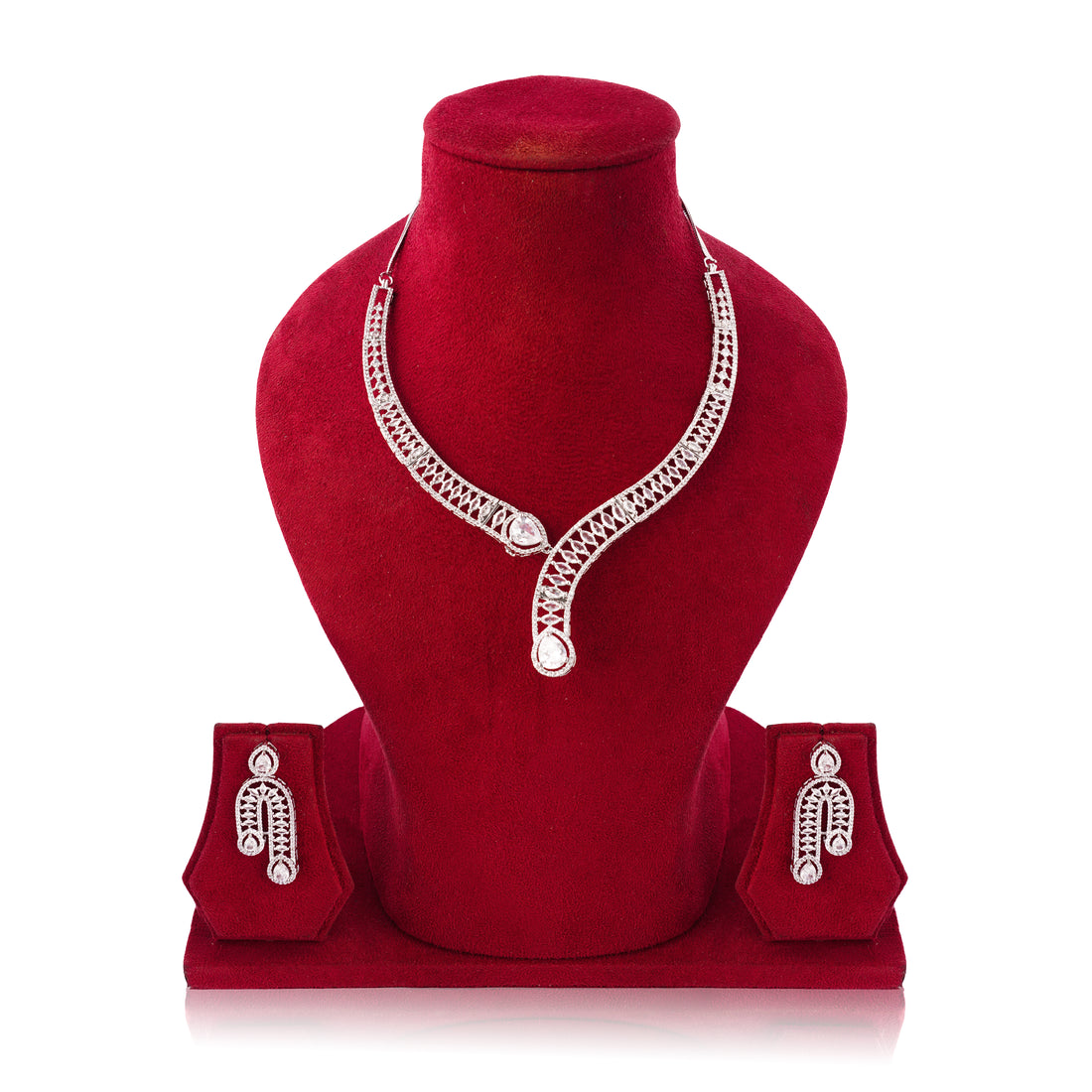 Jewelry set with necklace and earrings on a red velvet stand against a white background
